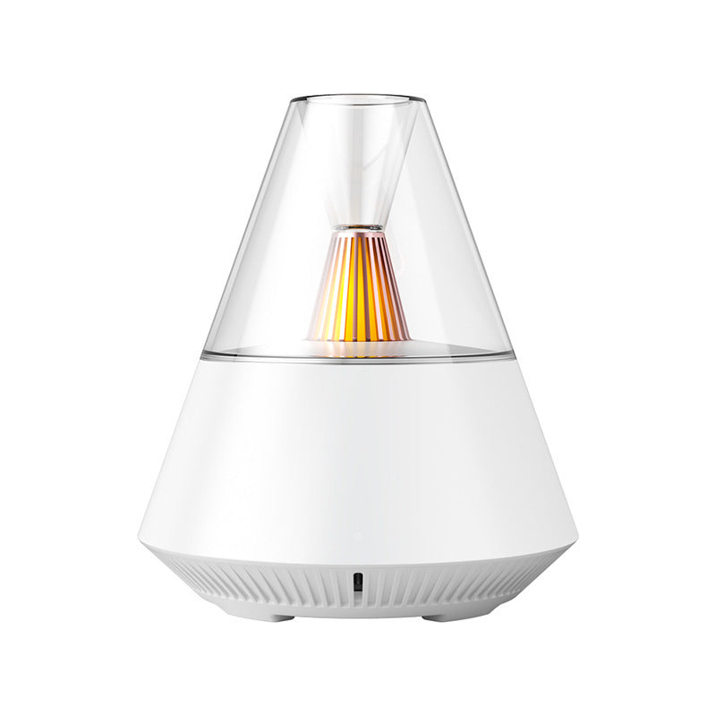 A white PyraMist Essential Oil Diffuser with a pyramid-inspired design, featuring a clear tank on top with a LED light.