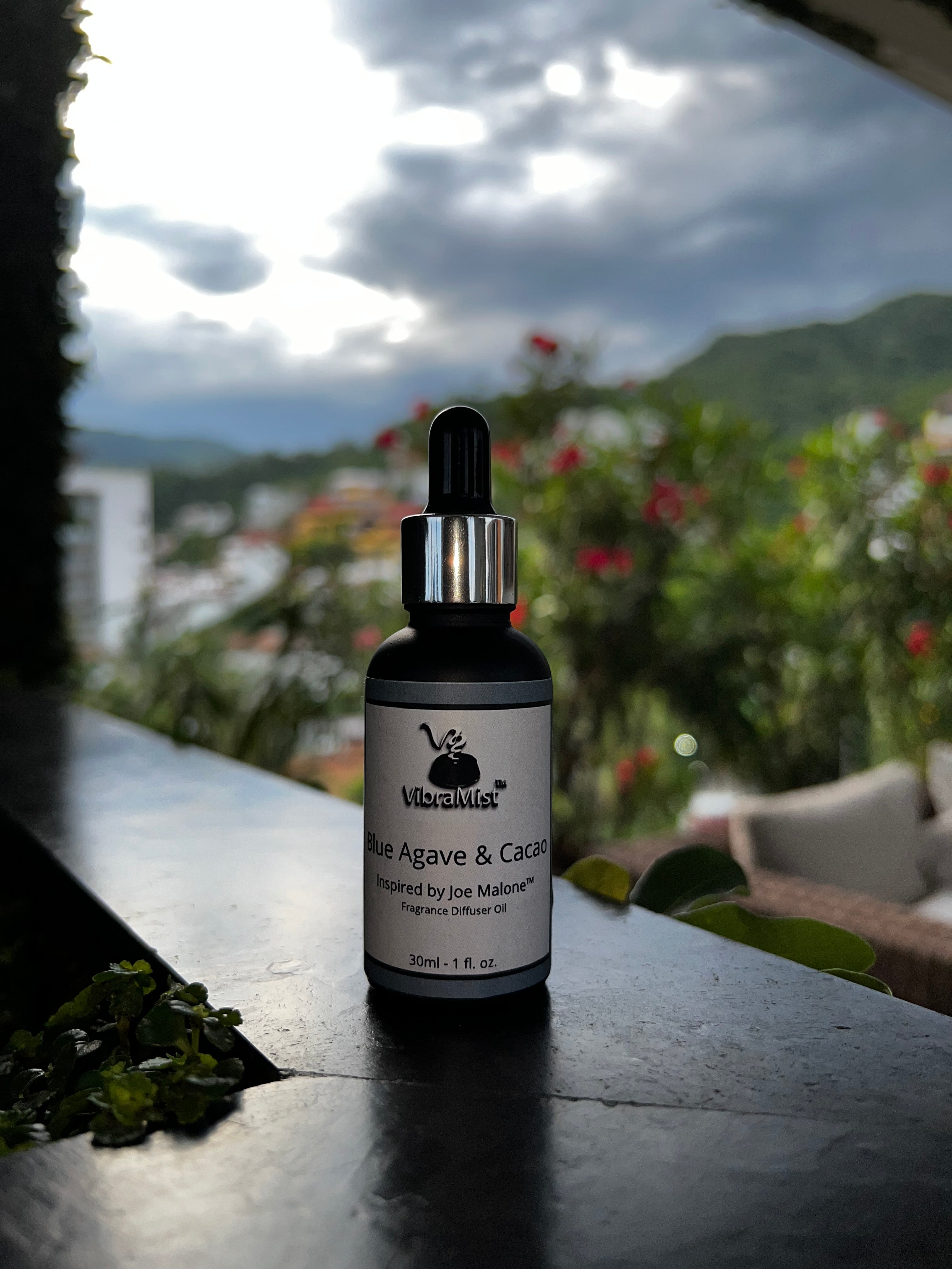 Blue agave and cacao diffuser oil overlooking mountain