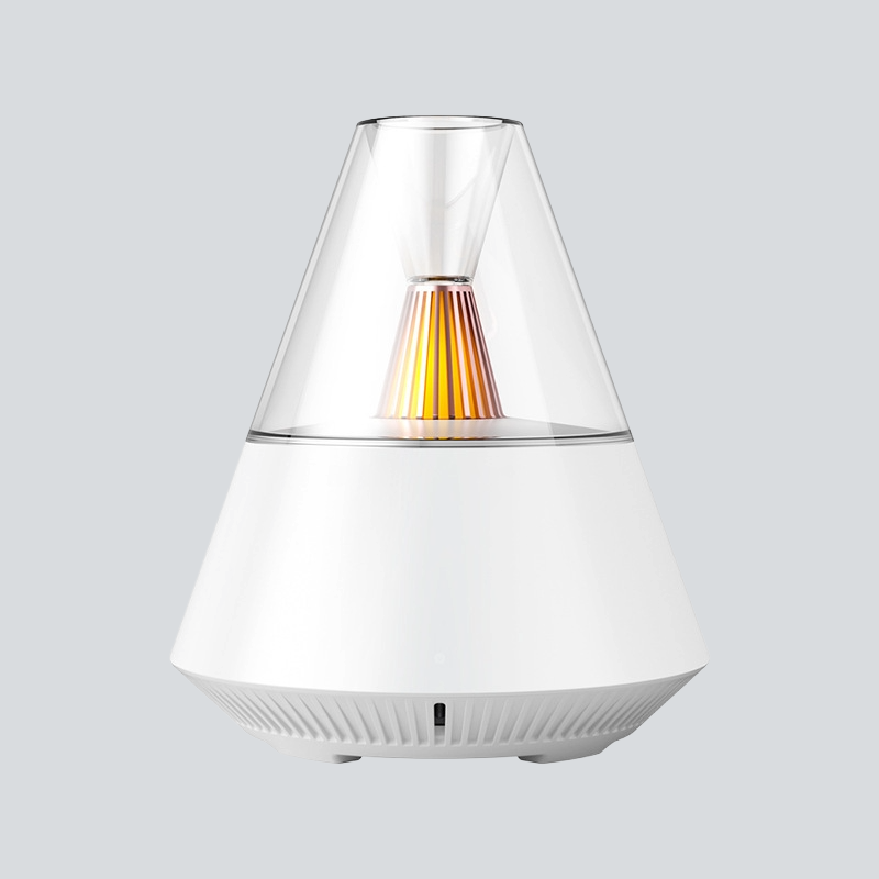 A white PyraMist Essential Oil Diffuser with a pyramid-inspired design, featuring a clear tank on top with a LED light.